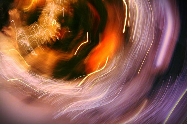 A person in motion, blurred to show flow and energy.