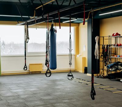 Empty modern gym space with minimal equipment.